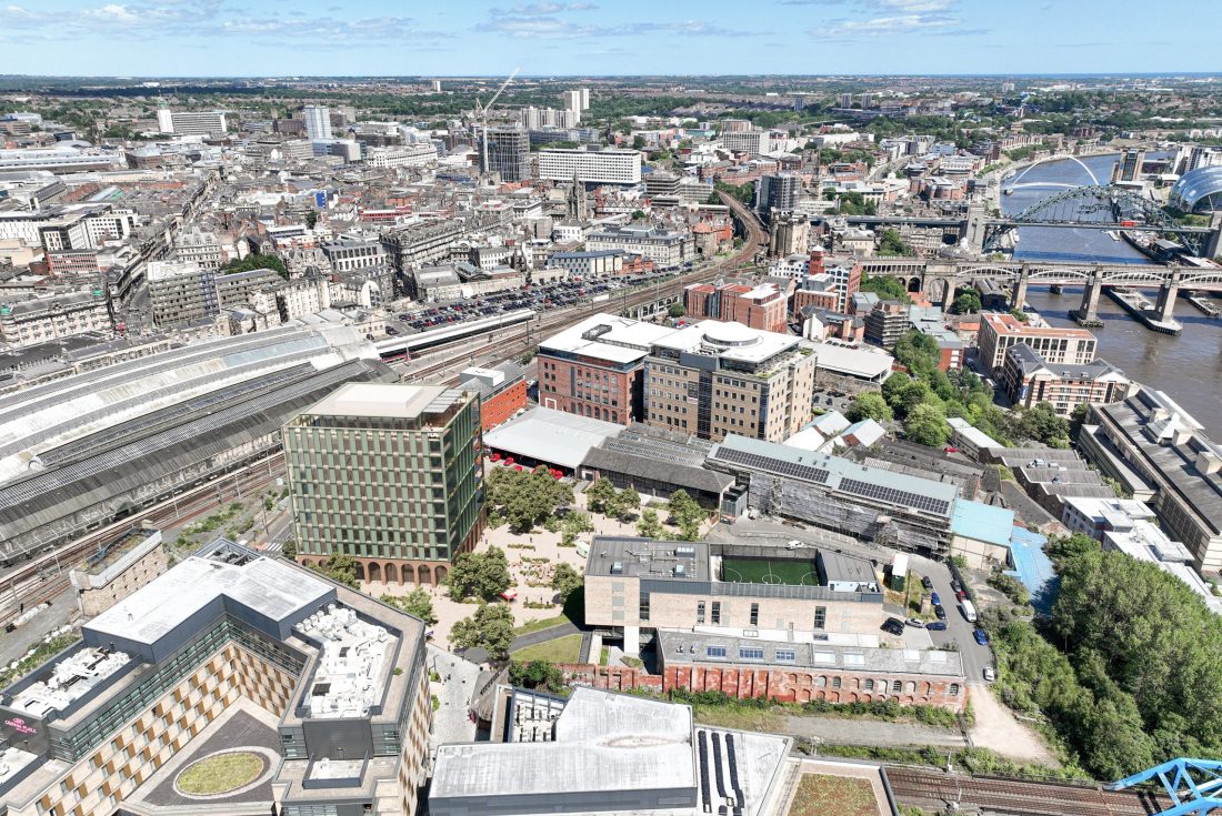 Aerial photo of Newcastle, with a CGI image of the modern development One Founders Place in the foreground, including a communal outdoor area with trees.